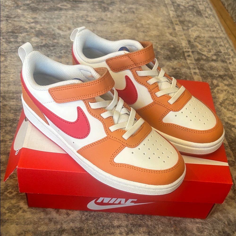Nike Kids' Orange and White Sneakers with Red Swoosh